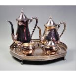 A silver plated tea and coffee service, comprising: a teapot with hinged cover, 24cm high, a