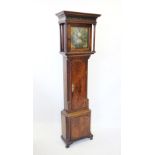 A mid 18th century oak and mahogany cross banded eight day long case clock signed Seddon of