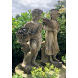 Three cast concrete figures emblematic of three of the seasons, modelled holding a basket of