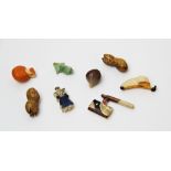 A collection of Japanese carved ivory miniatures, Meiji period (1868-1912), including a banana,