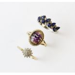 A sapphire and diamond ring, comprising eight marquise cut blue sapphires interspersed with eight