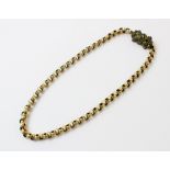 A Georgian pinchbeck chain, comprising circular granulated links set to a pierced floral design