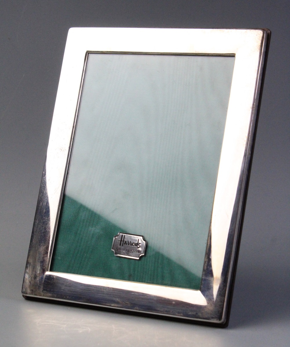 A white metal photograph frame, of rectangular form with plain polished borders, wooden backing - Image 2 of 2