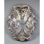 An Edwardian silver bonbon dish, S. Glass, Birmingham 1902, the dish with shaped rim and pierced