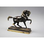 After Antoine-Louis Barye (French 1795-1875), a bronze-patinated statue modelled as a prancing