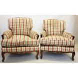 A pair of Louis XV style stained beech wood and upholstered armchairs, covered in chequered