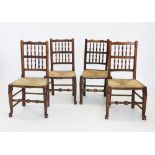 A harlequin set of four 19th century oak, ash and alder wood spindle back chairs, each with an