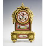 A 19th century French ormolu and pink porcelain inset 8 day mantel clock, movement by Japy Freres,