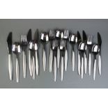 A large quantity of modern minimalist design Hong Kong made stainless steel cutlery, to include