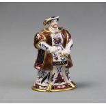 A Royal Worcester Connoisseur Collection candle snuffer, modelled as King Henry VIII, decorated in