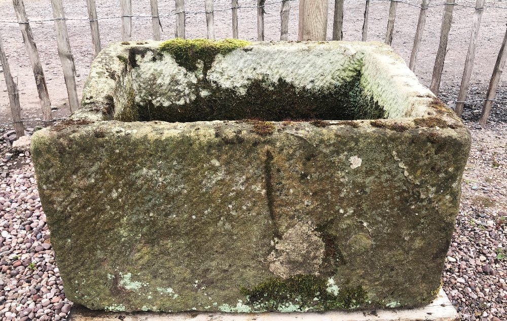 A large weathered sandstone trough/planter, of straight sided rectangular form, 49cm H x 88cm W x