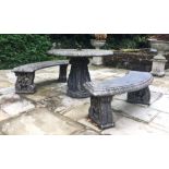 A reconstituted stone garden bistro set, comprising; a large circular table, 70cm high x 132cm