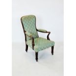 A William IV mahogany framed open armchair, the padded spoon back with a mahogany frame extending to