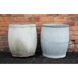 Two galvanised dolly tubs of typical reeded swelling form, 52cm high