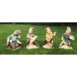 A group of four Henri Studio Palatine gnomes, concrete and painted details, comprising 2050, 2060,