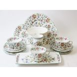A Minton 'Haddon Hall' part tea service, comprising: three cups, three saucers, three side plates, a