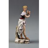 A Volkstedt Rudolstadt Arts series figurine, late 19th century, modelled as a contraposto lady