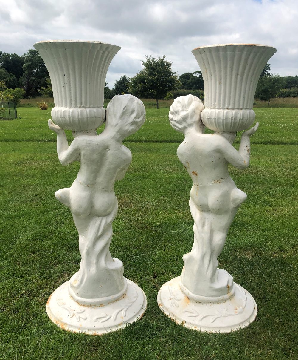 A pair of cast iron figural jardinieres, white painted, each modelled as a scantily clad putti - Bild 7 aus 11