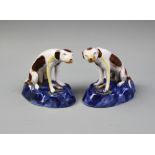 A pair of late 19th/early 20th century Paris porcelain hunting dogs, Edmé Samson imitating