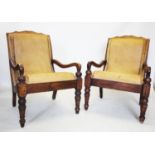 A pair of 19th century style hardwood plantation chairs, the tan leather padded backs extending to