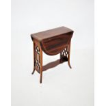 An Edwardian mahogany Sutherland table, the oval drop leaf top inlaid with satinwood banding, raised