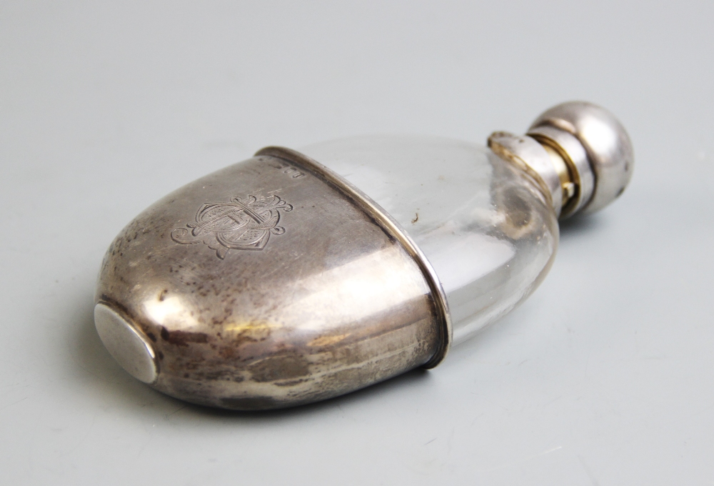 A Victorian silver mounted hip flask, William Hutton & Sons, London 1896, the oval flask mounted - Image 2 of 3