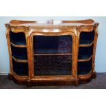 A Victorian burr walnut credenza, the shaped moulded top with satinwood cross banding, above a