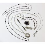 A selection of lady's vintage costume jewellery, to include a silver paste set drop necklace, a