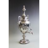A silver plated samovar, late 19th/early 20th century, of urn form, with relief cast floral and