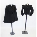 A collection of late 19th century lady's clothing, to include, a black silk bodice with puff