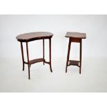 An Edwardian mahogany kidney shaped occasional table, the moulded top with inlaid stringing above