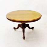 A Victorian mahogany loo table, the circular tilt top supported on a bulbous ring turned shaft