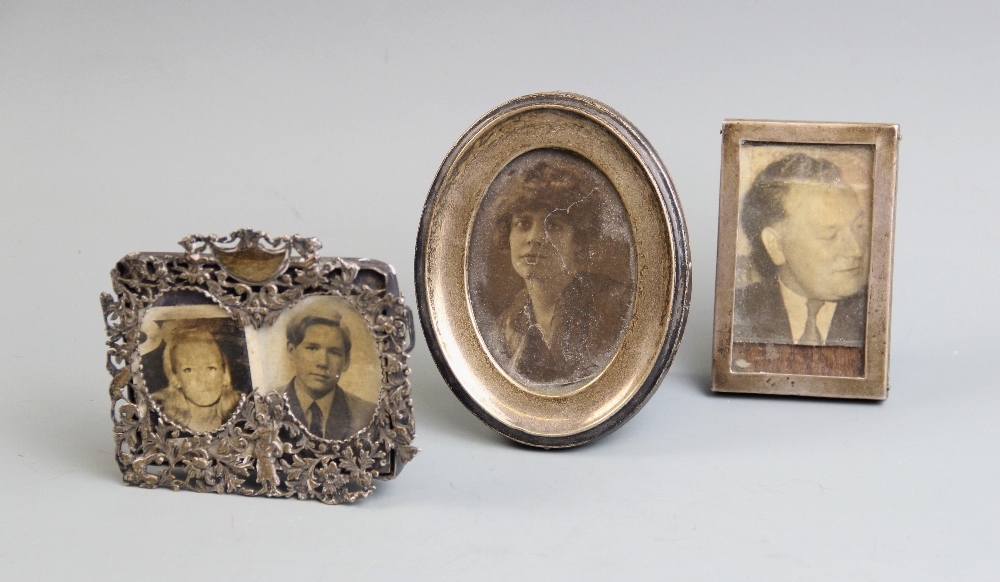 A silver mounted photograph frame, Birmingham 1910, of oval form with oak back and easel support, - Image 2 of 3