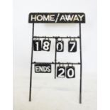 A painted iron bowling score frame, the top black panel painted with white text 'Home/Away', above