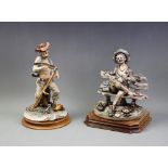 A Capo di Monte porcelain figural scene modelled as a tramp seated on a bench, set to a shaped