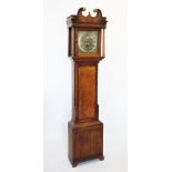 A George III oak cased long case clock by John Hartley, Burnley, the twin swan neck pediment above