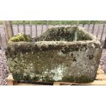 A large weathered sandstone trough/planter, of straight sided rectangular form, 48cm H x 90cm W x