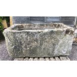 A very large sandstone trough, of straight sided rectangular form, 70cm H x 156cm W x 90cm D Note: