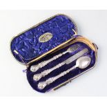 A cased Victorian silver three piece christening set, Hilliard & Thomason, Birmingham 1897,