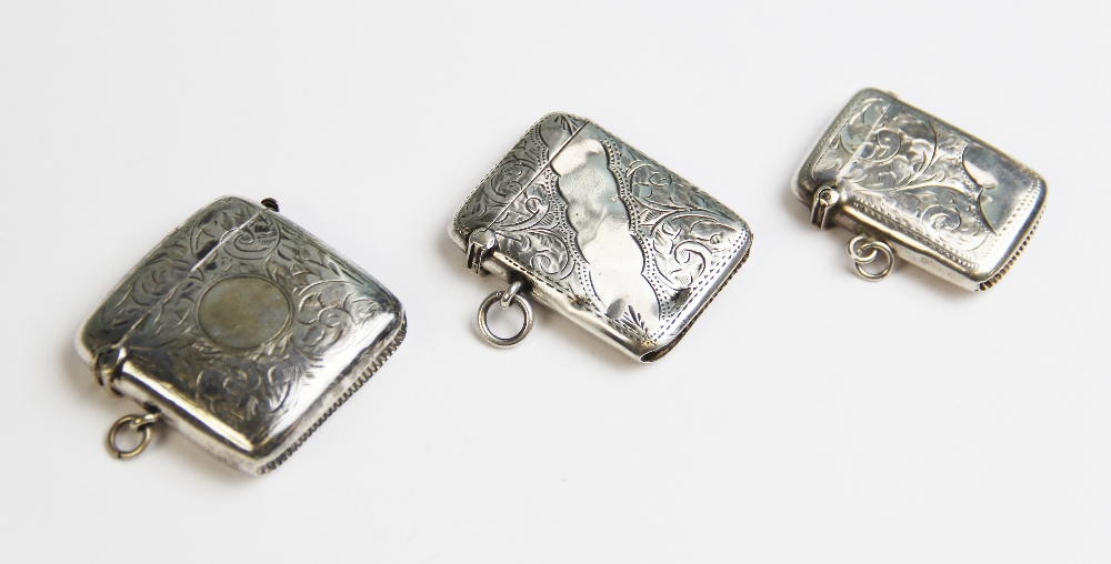 An Edwardian silver vesta case by William Hair Haseler, Birmingham 1908, with engraved scrolling