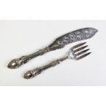 A pair of Victorian silver fish servers, John Gilbert, Birmingham 1859, both with moulded foliate