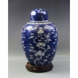 A large chinese porcelain blue and white prunus pattern ginger jar, of large ovoid form, restored