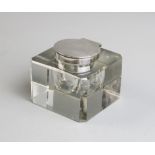 A George V large silver mounted cut glass inkwell, John Grinsell & Sons, Birmingham 1919, of