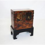 A Japanese parquetry kodansu, Meiji period, the rectangular cabinet with a pair of panelled doors