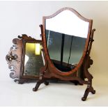 A George III mahogany fretwork mirror, of rectangular form with single mirror plate below a carved