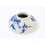 A Japanese Seto porcelain inkwell, Meiji period (1868-1912), of circular form tapering to a narrow