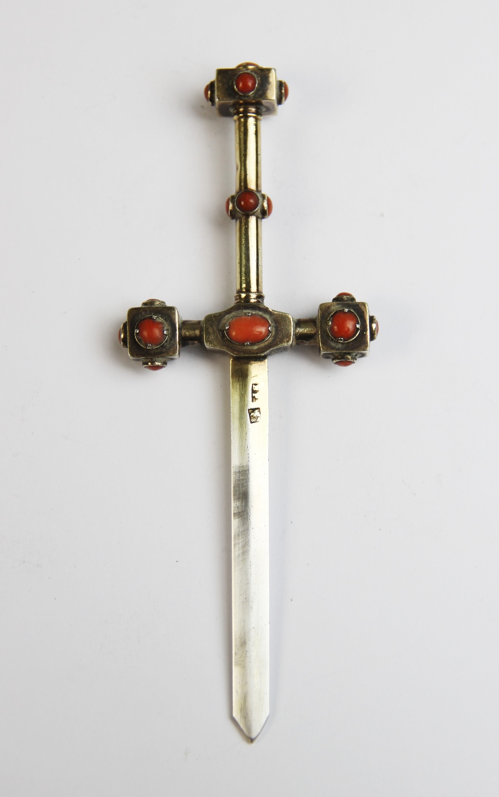 A Continental silver gilt novelty letter opener in the form of a sword, the hilt set with polished