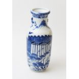 A Chinese porcelain blue and white rouleau vase, 19th century, depicting a trading port scene,