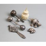 A collection of assorted child's rattles and accessories, to include a 19th century child's