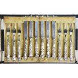 A George V cased set of six silver handled King's pattern fruit knives and six forks, CH Beatson,
